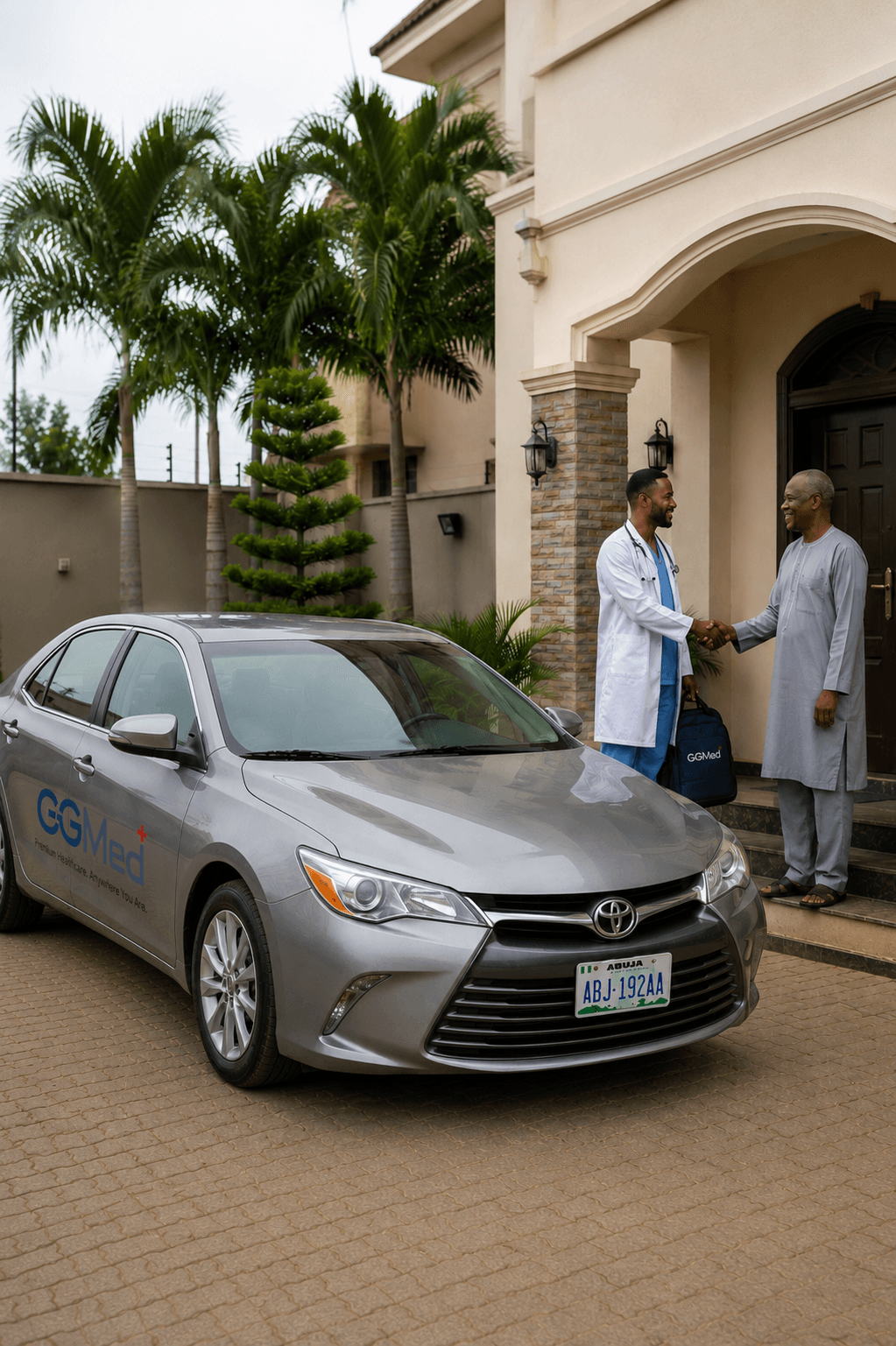 Doctor shakes hands with a man outside a house next to a branded GGMed car.